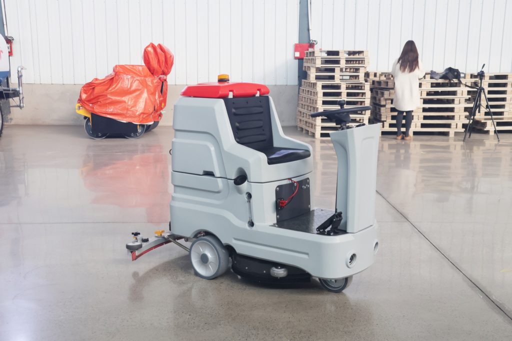 Actual GODWIN GDW5 ride-on scrubber in the company product photo